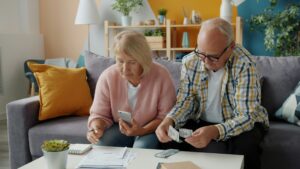 retired couple reviewing assets